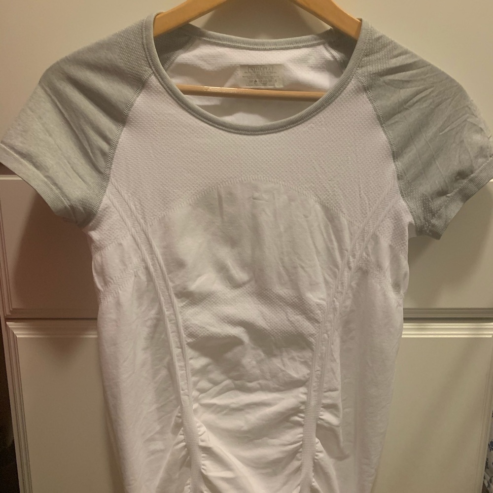 Athleta T.  Super soft and flattering.